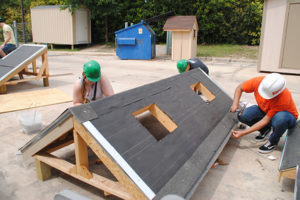 Warren Construction Careers Academy students build tiny House